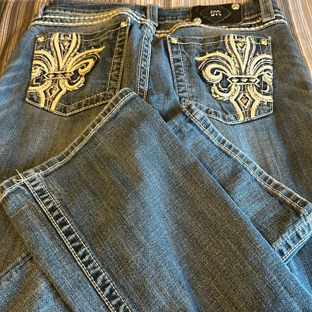 Miss me size 31 few scuff marks on the front but not ripped or torn